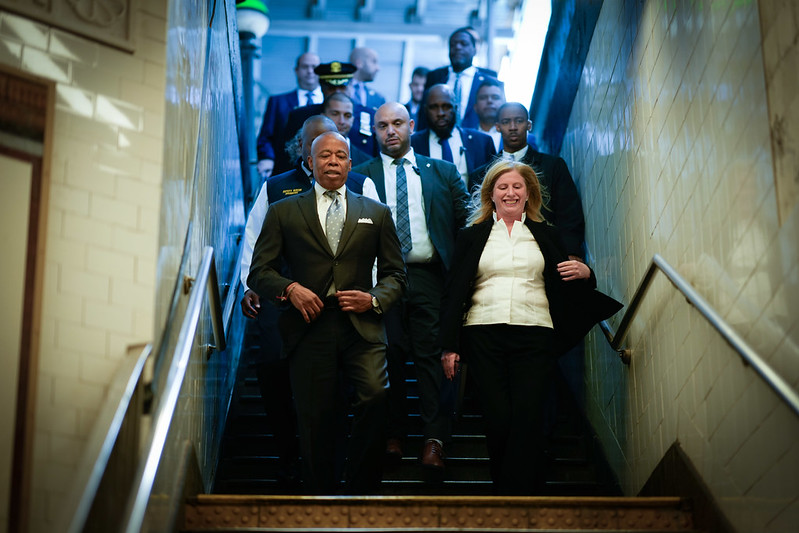 Mayor Eric Adams and Police Commissioner Jessica Tisch arrive at the 42nd Street–Times Square subway station on Friday, ahead of the heated news conference marking the one-year anniversary of the PATH outreach program.