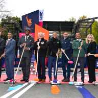 NYC MARATHON: Finish line in Central Park is ready for runners after painting ceremony 12 people painting finish line of NYC Marathon