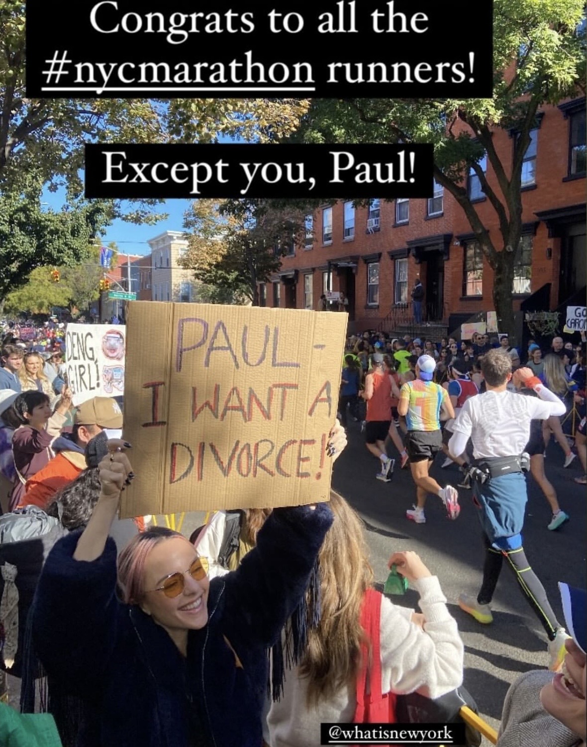 The sign reads "Paul I want a divorce"