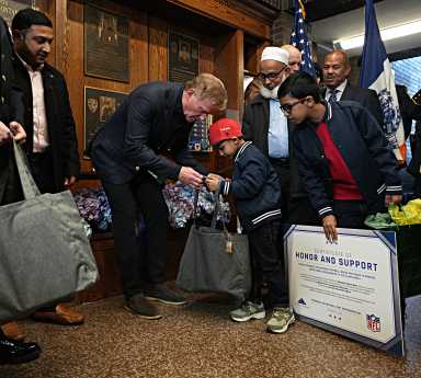 Sons of Slain NYPD Officer Receive Full Scholarships from NFL and Folds of Honor Sons of Slain NYPD Officer Receive Full Scholarships from NFL and Folds of Honor