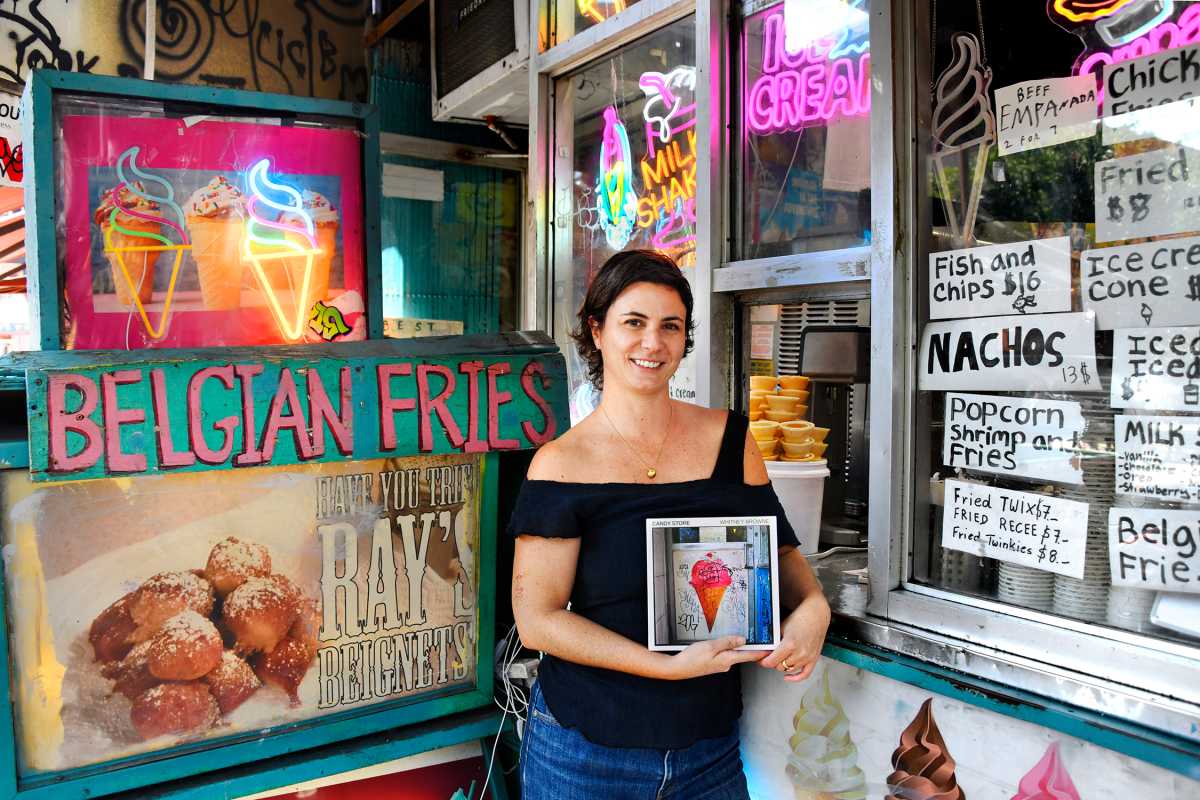 Whitney Browne with her book "Candy Store" at Ray's Candy Store