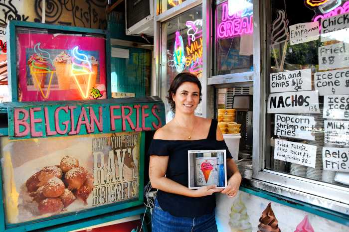 Whitney Browne with her book "Candy Store" at Ray's Candy Store