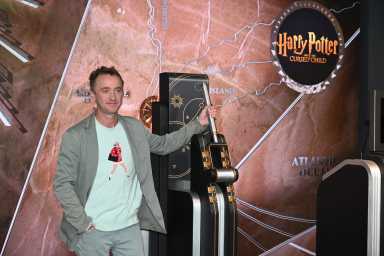 Actor Tom Felton lit the Empire State Building ahead of his Broadway debut in "Harry Potter and the Cursed Child."