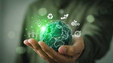 business hands holding the green world for the Sustainable Development Goals.Corporate social responsibility CSR.World Environment Day. Responsibility for the environment. Save and protect the world.