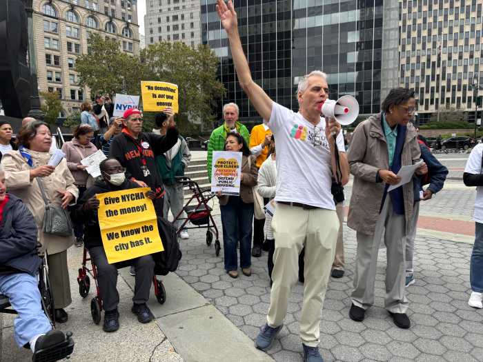 John Mudd of South Community Council protests relocation and demolition