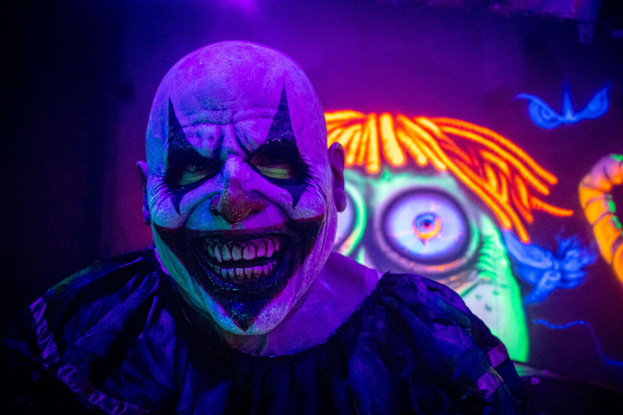 Take a peek behind the scenes of the screams of BloodManor 3 a clown at BloodManor