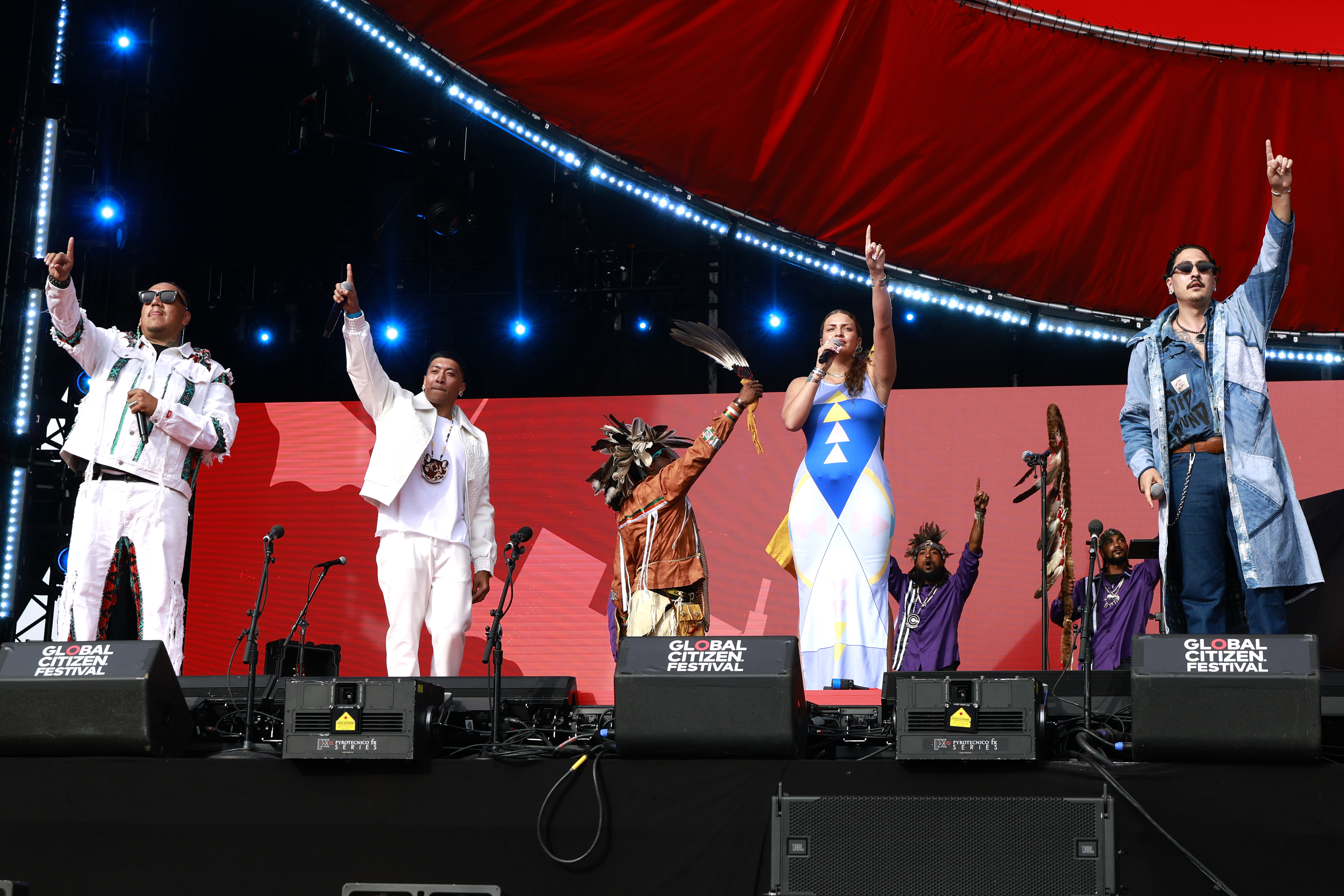 NEW YORK, NEW YORK - SEPTEMBER 27: Members of the Lenape Tribe perform onstage during the 2025 Global Citizen Festival at Central Park on September 27, 2025 in New York City. (Photo by Kevin Mazur/Getty Images for Global Citizen)