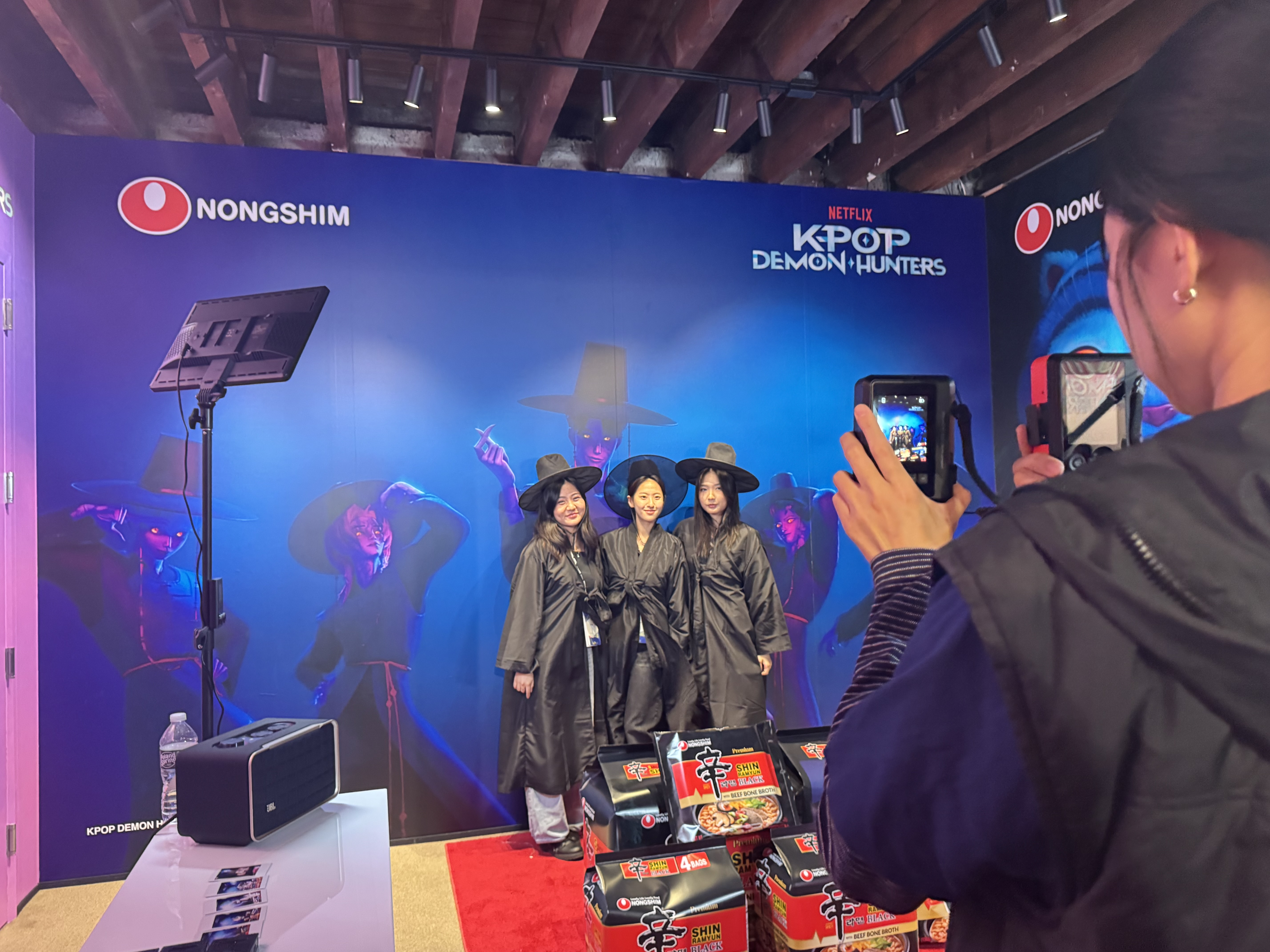 KOOM Festival 2025 showed the beauty of Korean culture and ingenuity, one dream at a time 7 Attendees enjoy a K-pop Demon Hunter display.