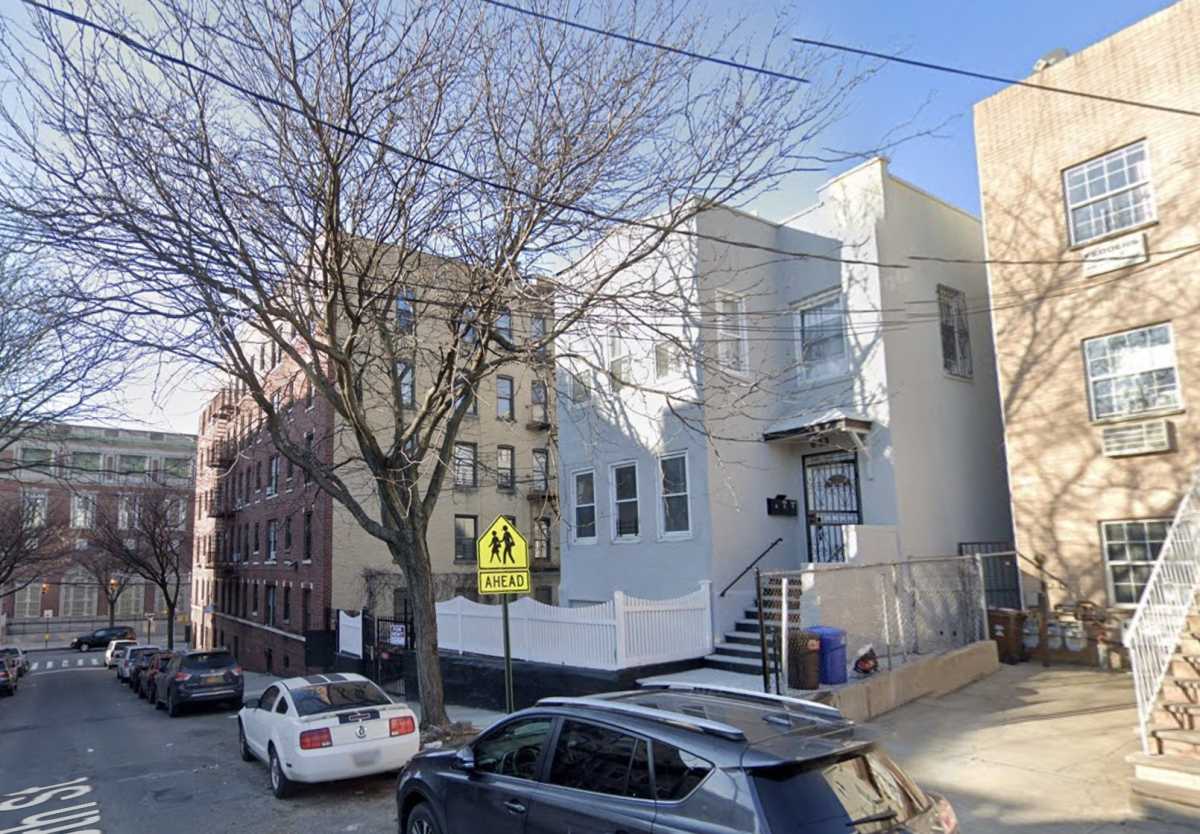 View of the Wakefield residence, where police say three people were shot and wounded Sunday following a dispute between two women.