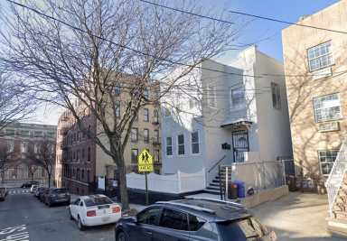 View of the Wakefield residence, where police say three people were shot and wounded Sunday following a dispute between two women.