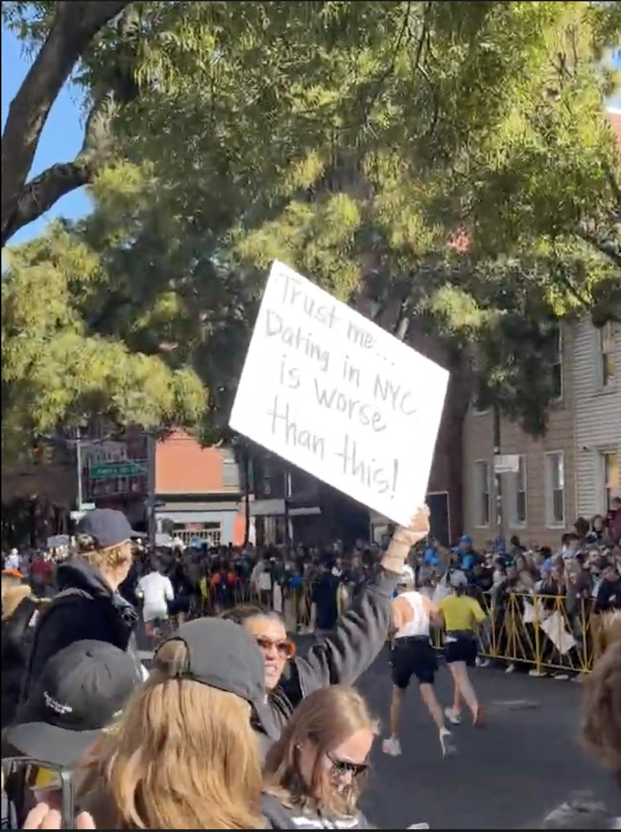 NYC MARATHON | The funniest NYC Marathon signs that could only exist here 2 The sign reads:  “Trust me… dating in NYC is worse than this!”