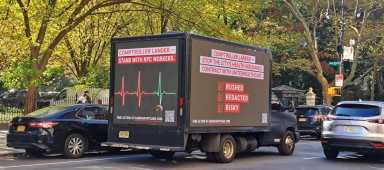 HandsOffNYCare hired an LED truck to circle the Comptroller’s office all week as he decides whether to certify or reject the contract