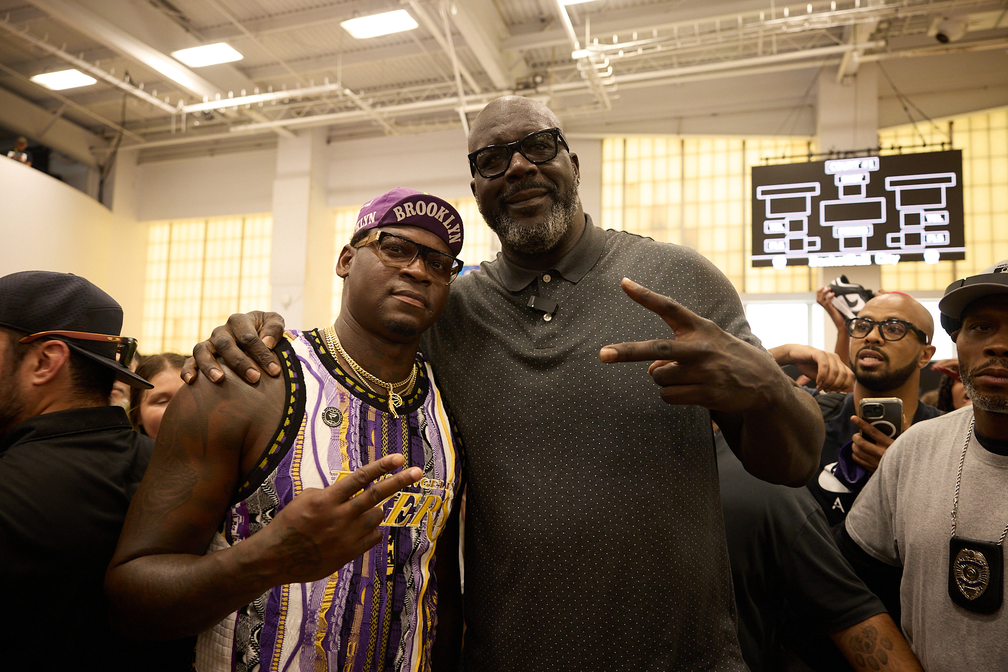 Shaquille O’Neal surprises fans with exclusive sneakers, taking to NYC basketball courts in the Shaq-A-Licious truck 2 Smush Parker and Shaq