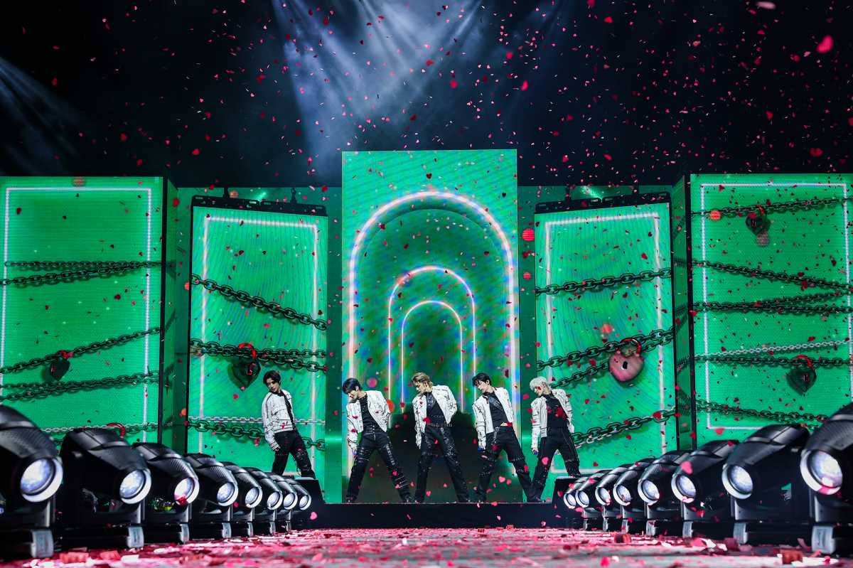 TOMORROW X TOGETHER (TXT) performing at the Prudential Center.