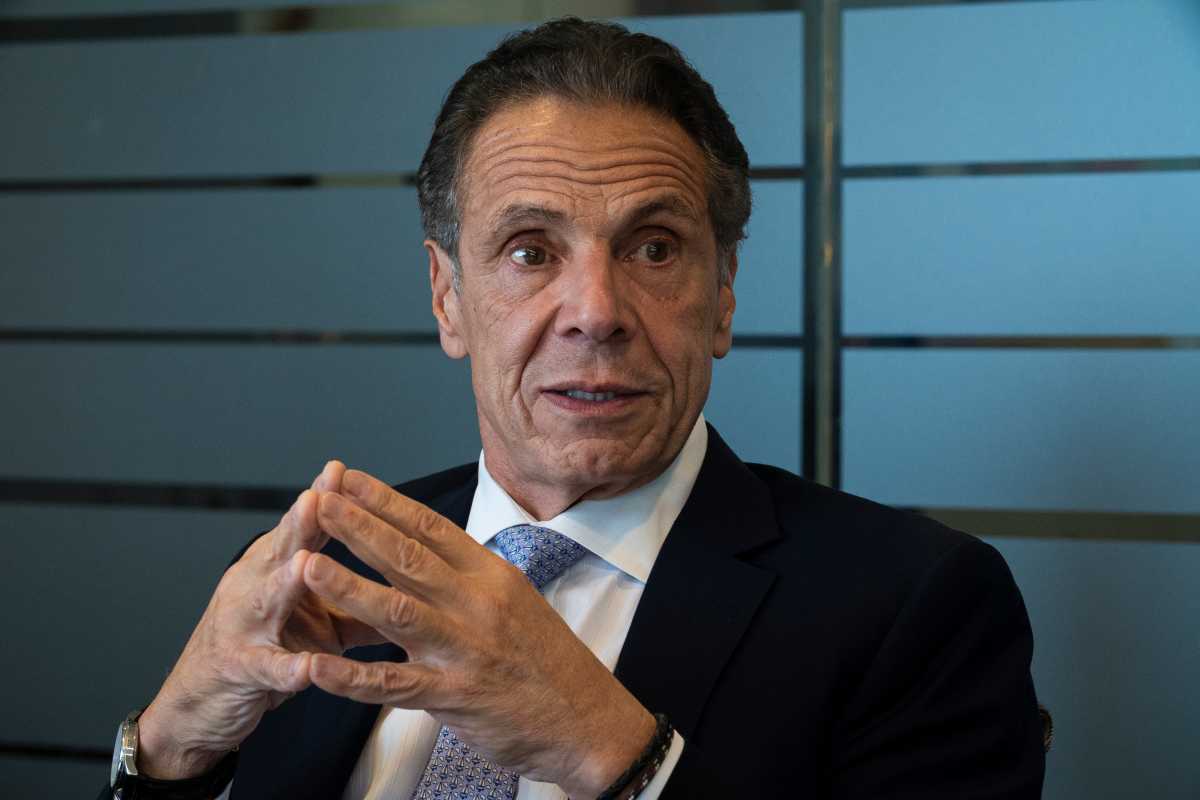 man wearing a suit and tie Andrew Cuomo