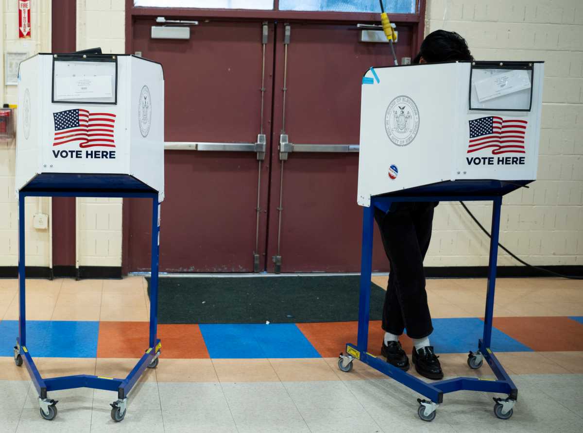 A person cast their vote duing the first day of early voting in the general election in Brooklyn on Oct. 25, 2025.