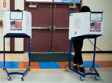 A person cast their vote duing the first day of early voting in the general election in Brooklyn on Oct. 25, 2025.