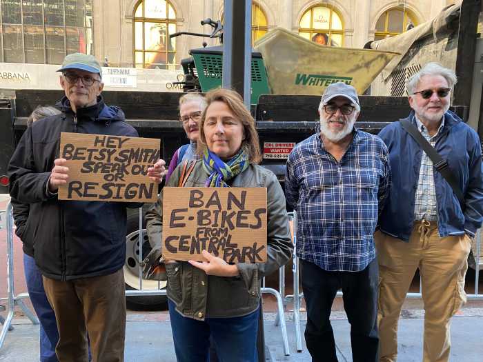 Central Park chaos: Safety advocates demand end to 'e-bike expressway' in NYC parks 3 group of people holding signs on a city street