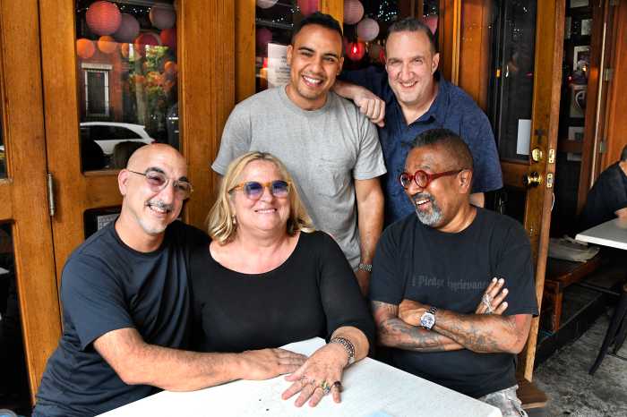 The team responsible for "Sunday at Il Posto Accanto": seated, Seth Svi Rosenfeld, Beatrice Tosti di Valminuta, Julio Pena. Standing, Victor Rasuk , Danny Hoch