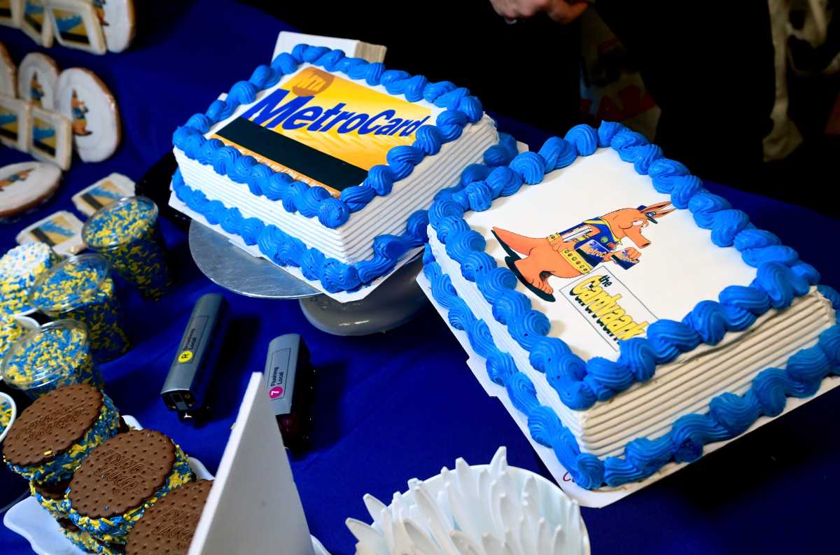 cakes on a table with a blue table cloth