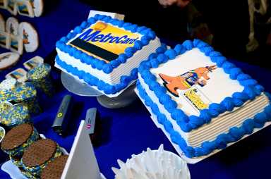 Fantastic fare-well: How the MTA and famous NYC food vendors are giving the MetroCard a delicious departure 4 cakes on a table with a blue table cloth