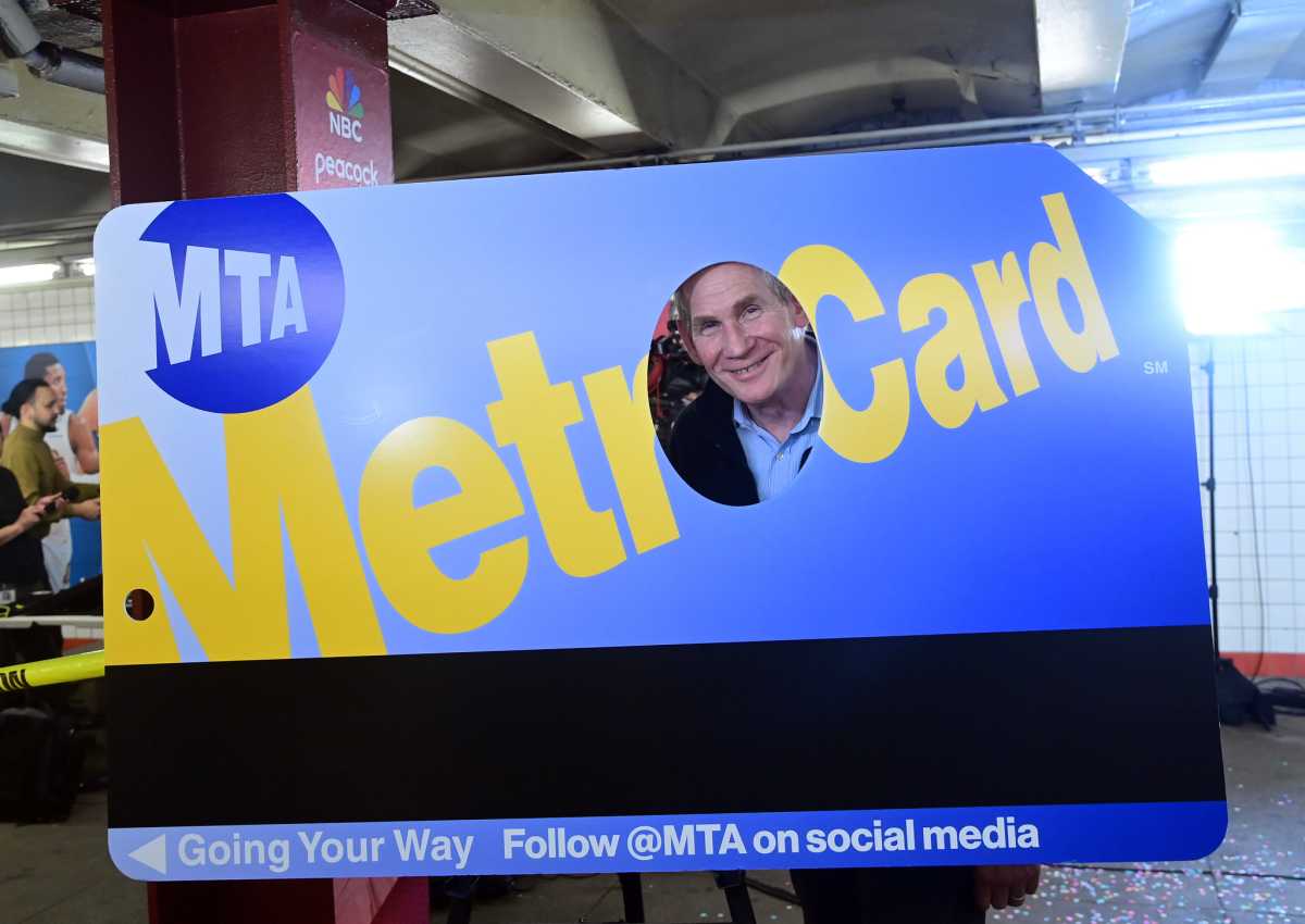 Remembering the MetroCard — NYC's beloved subway and bus fare card, which goes the way of the token on Dec. 31 2 a large MetroCard prop that is yellow and blue