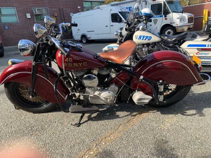 Band of blue: Retired NYPD officers with thousands of artifacts advocate for opening new police museum in NYC 2 a red vintage motorcycle