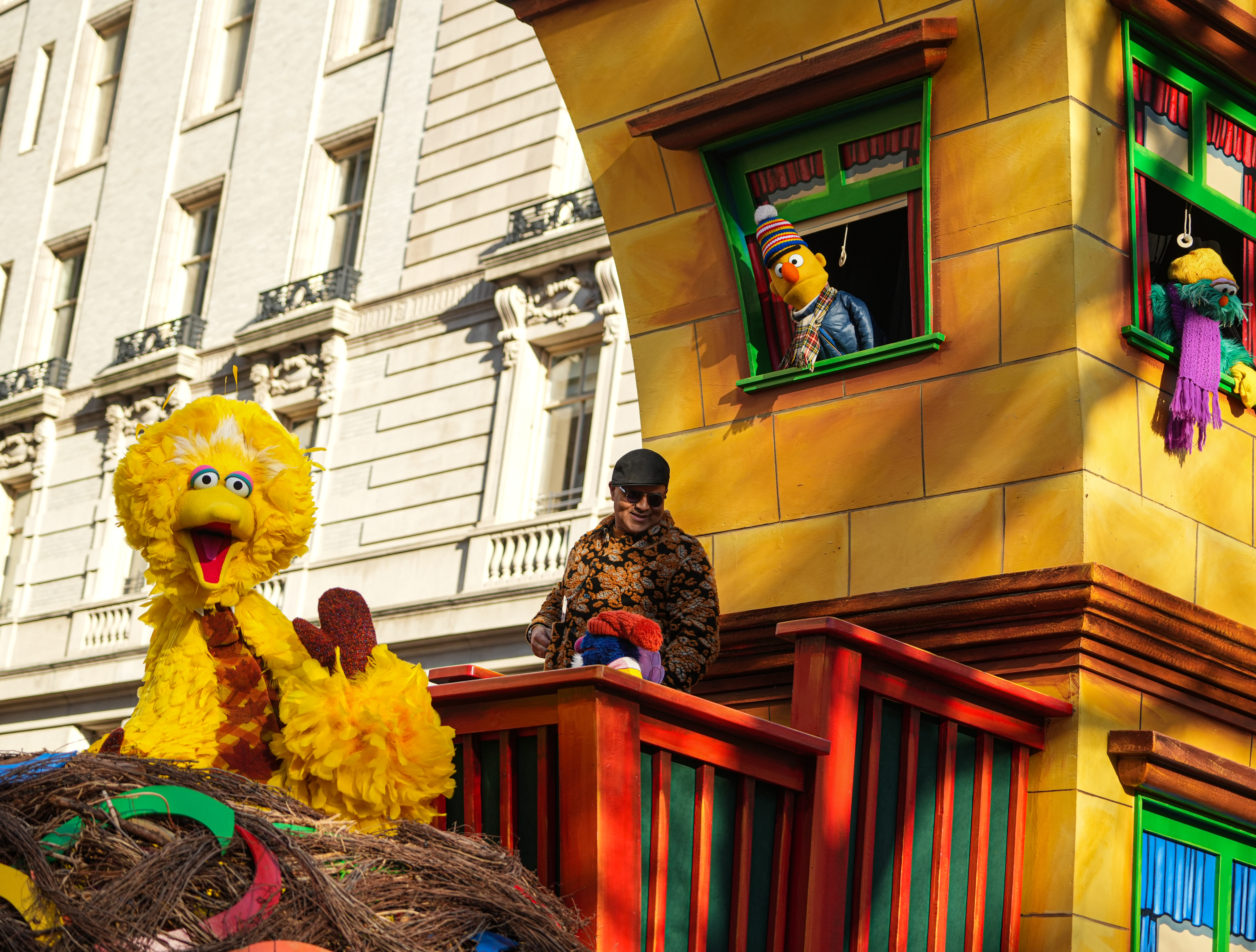 Christopher Jackson with Big Bird and Bert on the Sesame Street float at the Macy's Thanksgiving Day Parade.