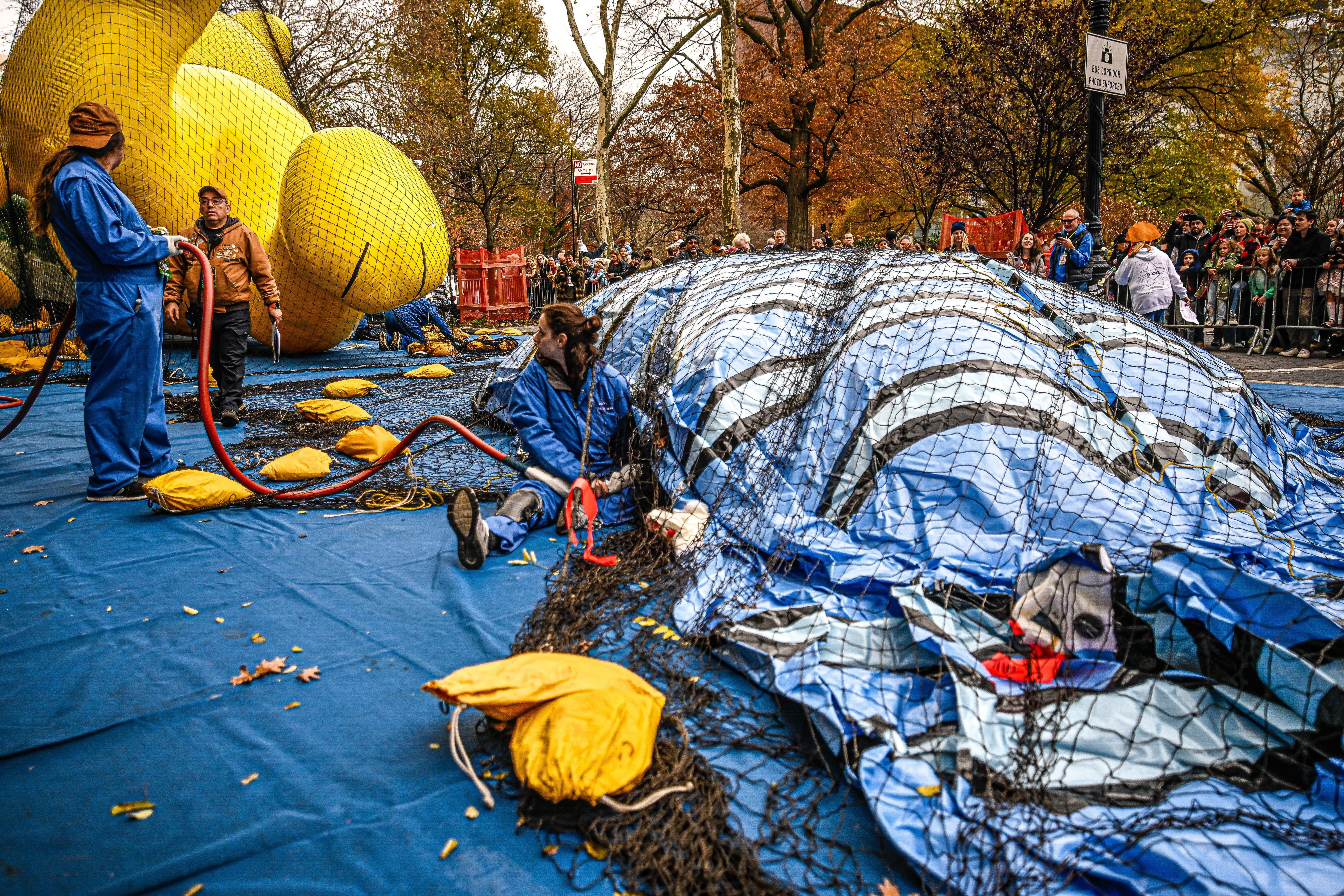Workers inflate the Macy's Thanksgiving Day Parade balloons.