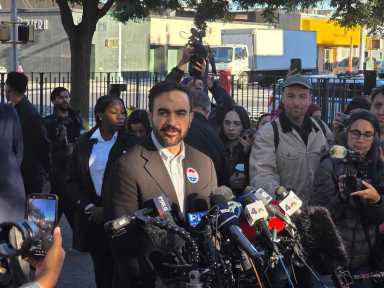 Zohran Mamdani speaking to reporters after voting