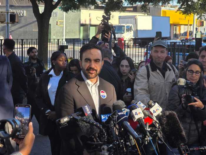 Zohran Mamdani speaking to reporters after voting