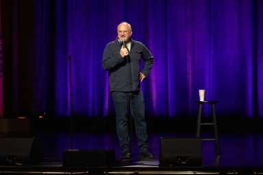 Stand-up comedian Louis C.K. performing