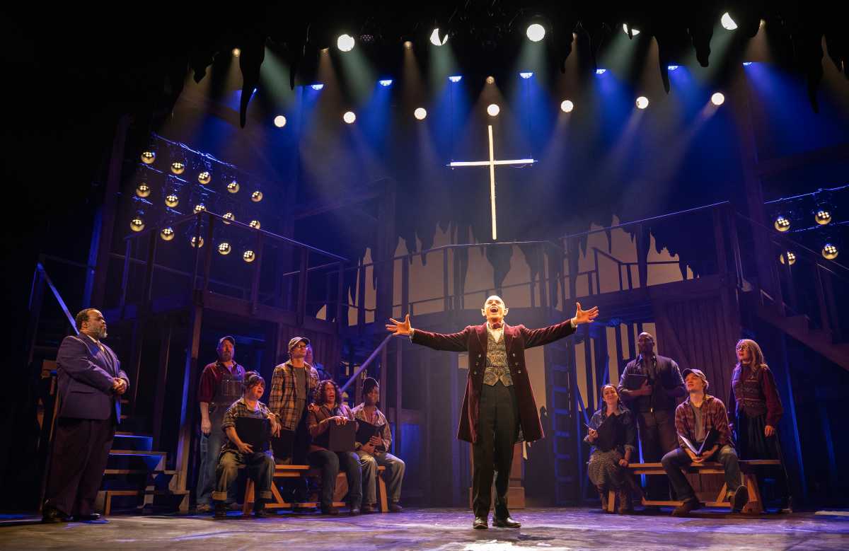 man playing Bat Boy in musical