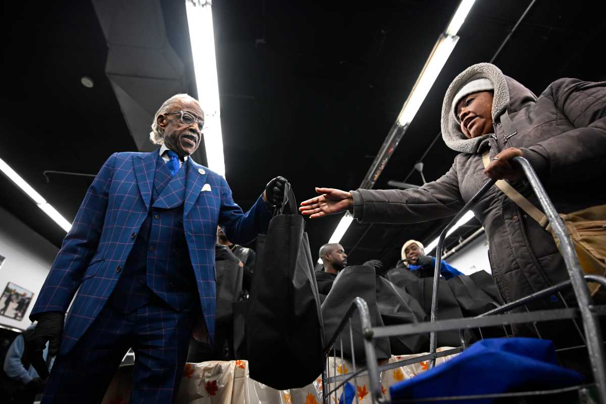 Rev. Al Sharpton provides Thanksgiving turkeys in Harlem