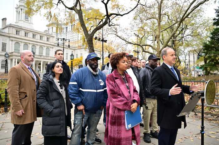 Council Member Selvena Brooks-Powers and attorney Jerome Block lead Tuesday's press conference, flanked by survivors and advocates, ahead of the City Council vote to restore GMVA claims.