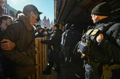 Mayhem erupted outside of a Chinatown parking garage on Saturday after protesters learned of a massive ICE presence inside.
