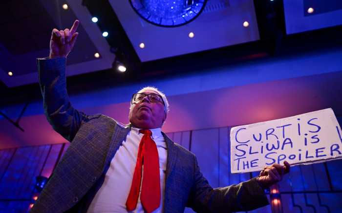 Andrew Cuomo concedes NYC mayoral race, congratulates Mayor-elect Mamdani after polls closed 6 David Rem made a pronounced entrance waving this sign at Andrew Cuomo’s election night party