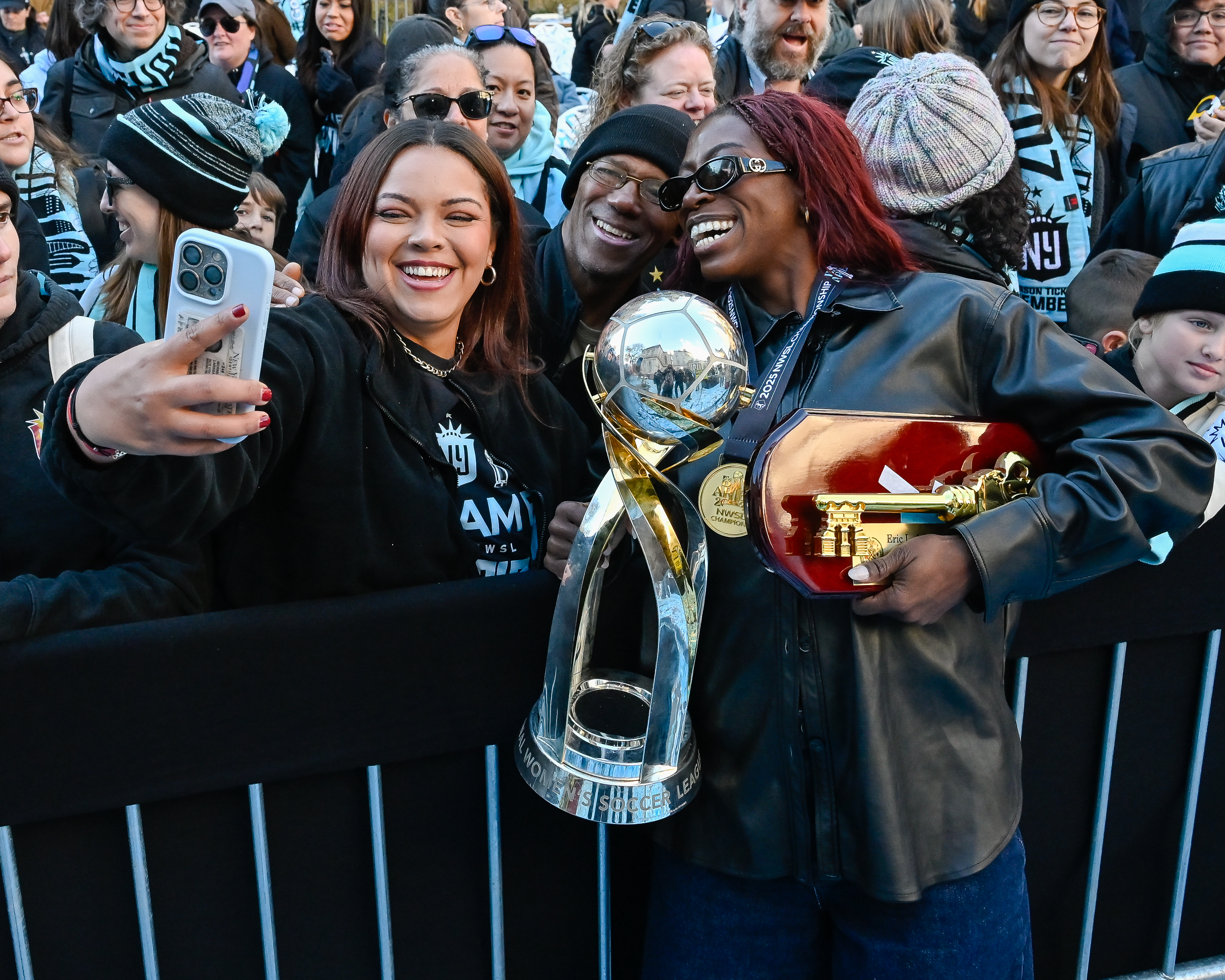 Gotham FC player Mandy Freeman poses for photos with fans after the ceremony. 