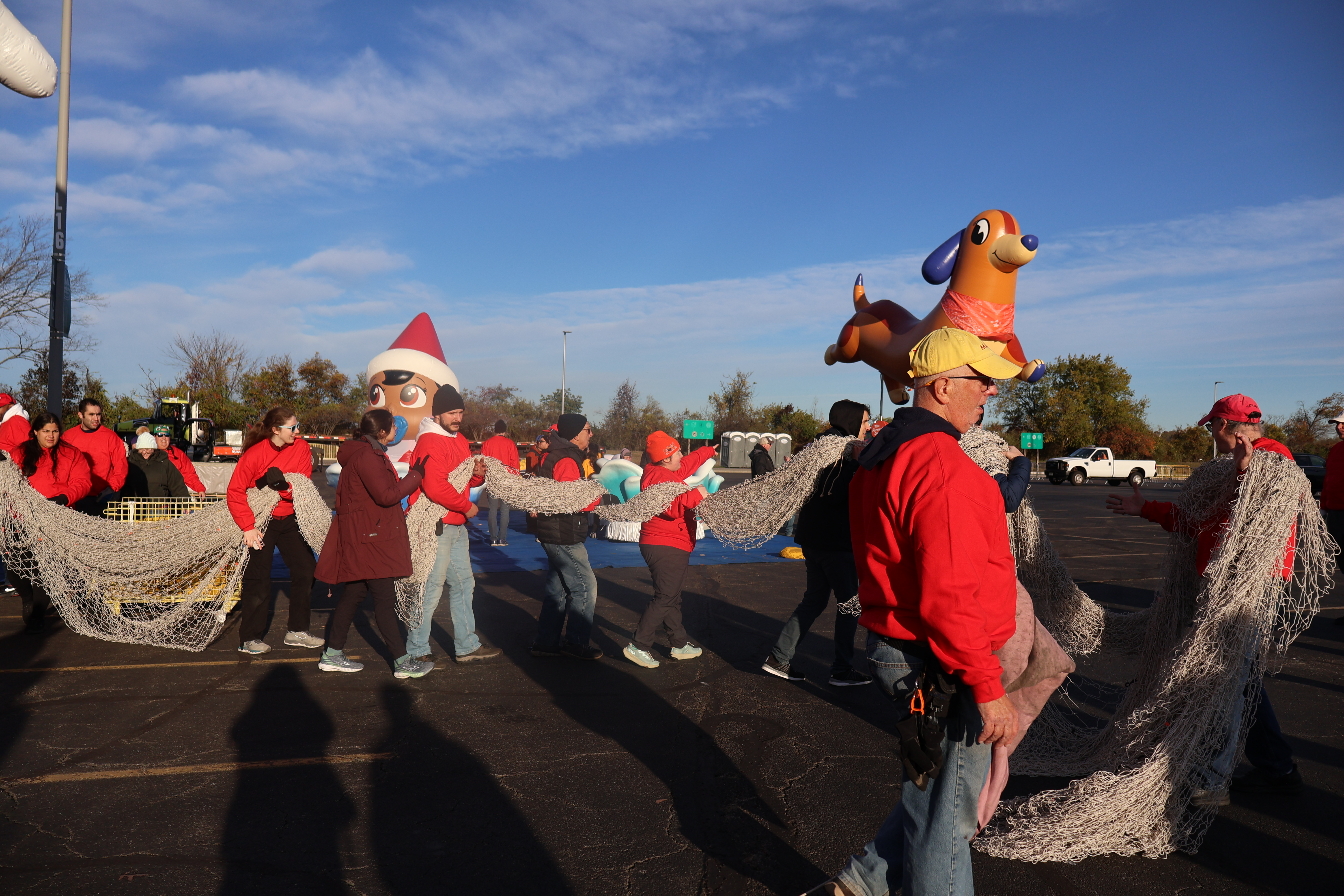Buzz Lightyear, PAC-MAN among new Macy's Thanksgiving Day Parade balloons unveiled at Balloonfest 5 Volunteers at Balloonfest ready the balloons.