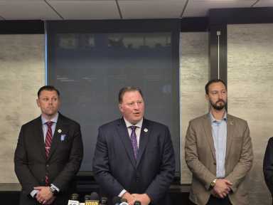 FDNY-Uniformed Firefighters Association President Andrew Ansbro speaks to the media following the discovery of 68 boxes of documents related to 9/11-related toxins at a DEP facility last week. Photo by Shane O'Brien.