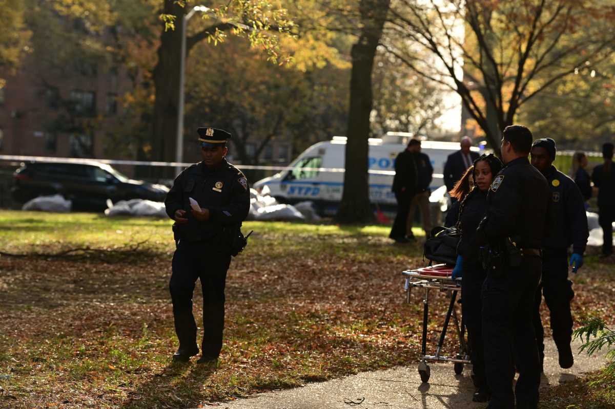 Members of the Office of Chief Medical Examiner wheel away the body of an infant found dead at the Bayview Houses in Brooklyn on Nov. 20, 2025.
