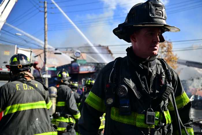 firefighters at a job during the day