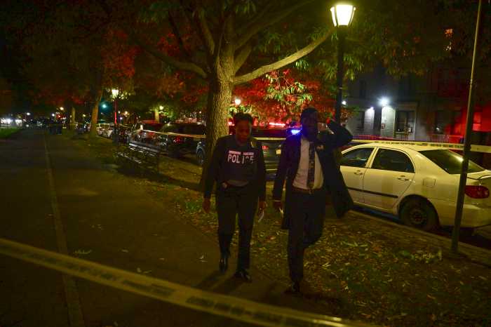 police officers walking at night