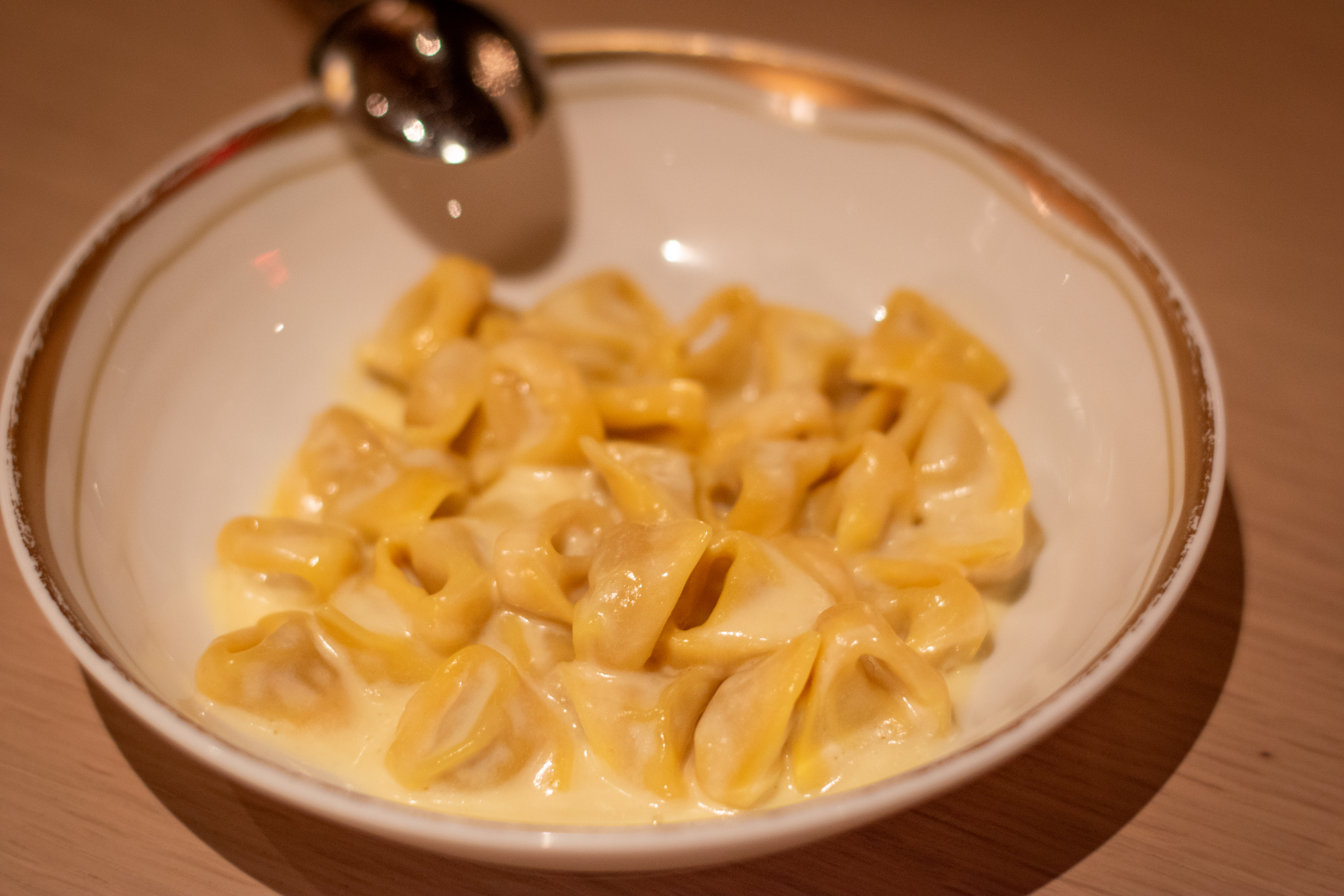 Santi: Where art, tradition, and innovative Italian flavors unite in Midtown East 3 Tortellini, classic meat filled ravioli.