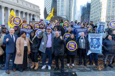 people celebrating The New York City Council passed the Aland Etienne Safety and Security Act.