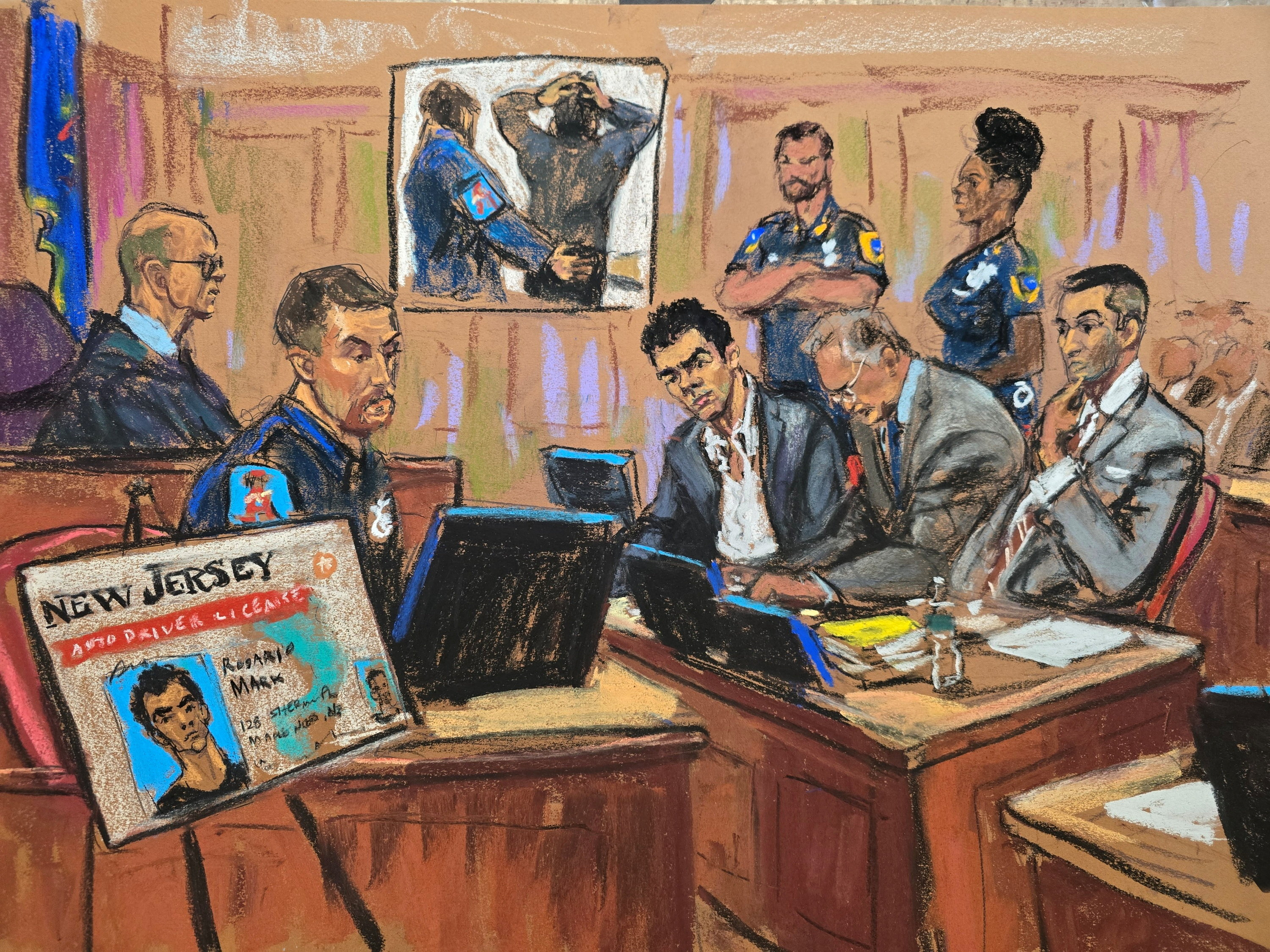 Officer Tyler Frye testifes as body camera footage is shown and a fake ID is displayed as Luigi Mangione, who was arrested in December 2024 and charged with fatally shooting UnitedHealthcare CEO Brian Thompson on a sidewalk in Midtown Manhattan, attends state court hearings over whether prosecutors can use his police statements at his murder trial in New York City, U.S., December 4, 2025 in this courtroom sketch. 