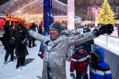 Man revels in NYC snow during snowstorm