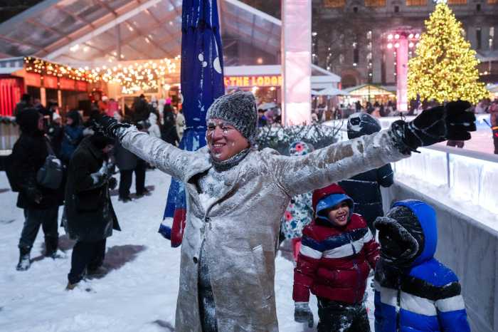 Man revels in NYC snow during snowstorm