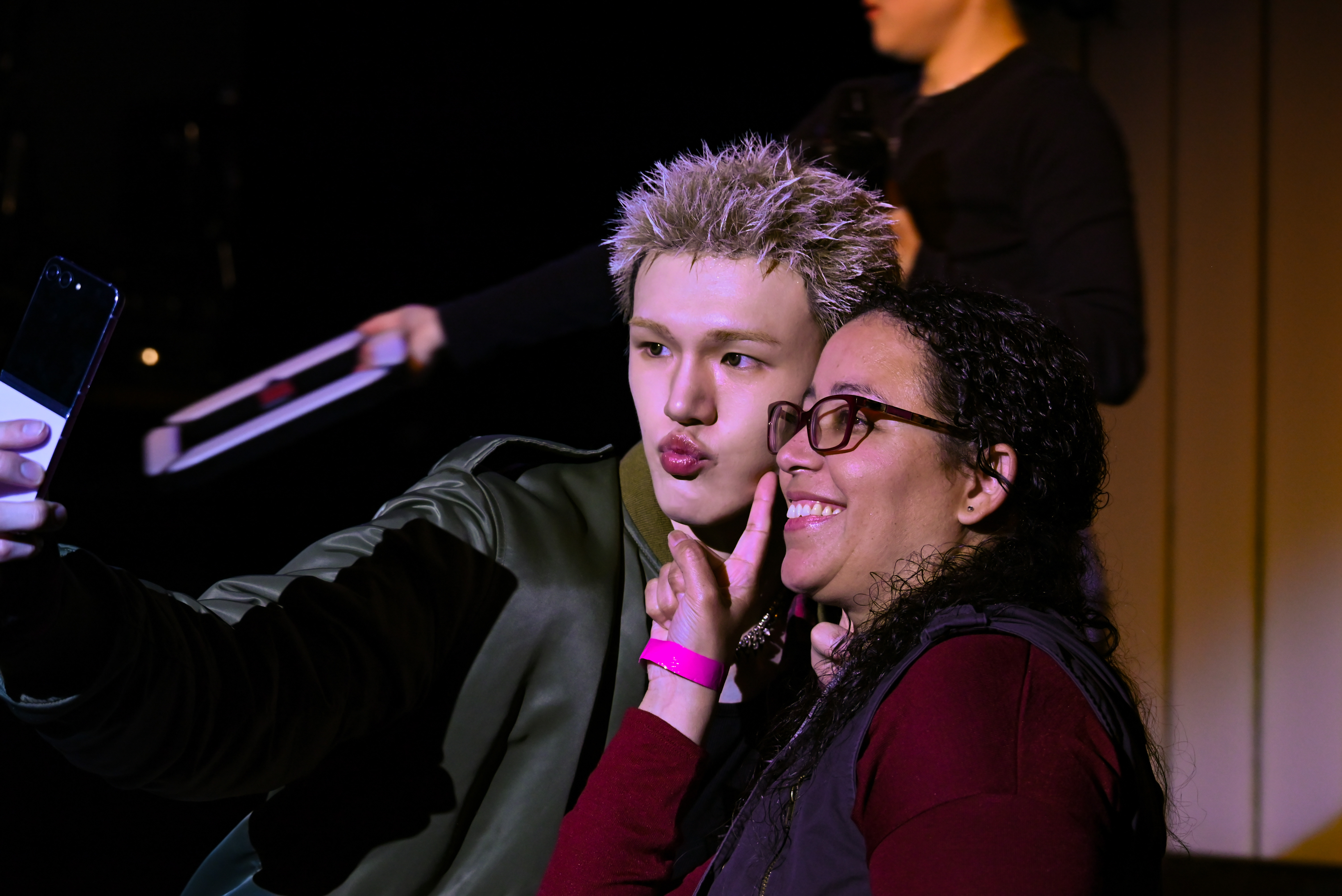 JUSTB taps into K-pop’s new listening party phenomenon with a holiday-ready Black Friday experience in Brooklyn 2 JUSTB member Bain cheerfully took selfies with fans.