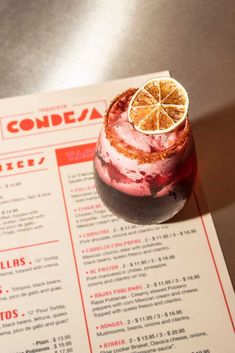 Condesa delivers art deco glow, bold tacos, and true warmth in Hell's Kitchen 2 Beso Rojo cocktail at Taqueria Condesa in Hell's Kitchen
